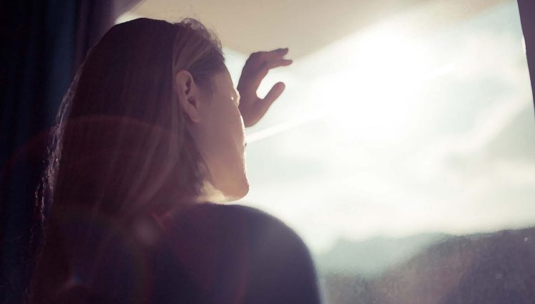 Women looking out window